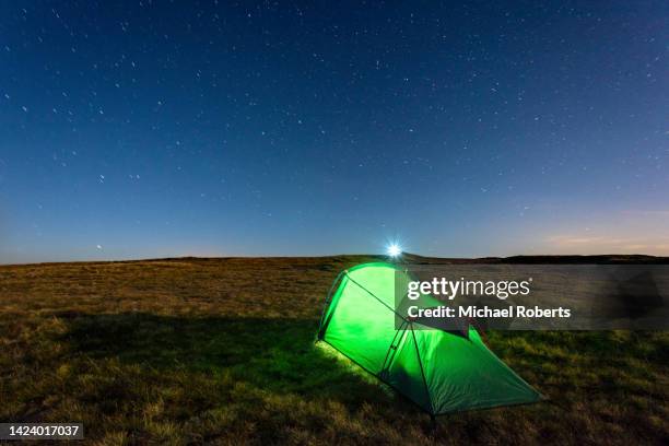 wild camping on the summit of pen y fan in the brecon beacons, wales. - brecon beacons national park stock pictures, royalty-free photos & images