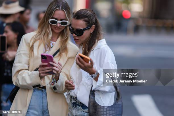 Fashion week visitor seen wearing Balenciaga shades, Loewe shirt and Coperni bag, outside PatBo Show during New York Fashion Week on September 10,...