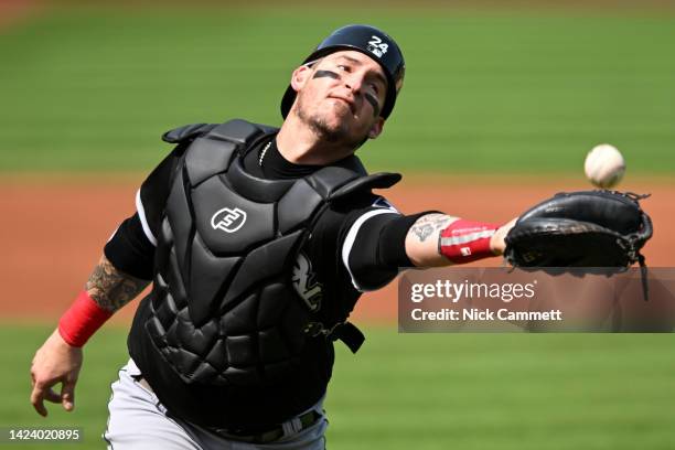 Yasmani Grandal of the Chicago White Sox commits an error on a pop fly hit by José Ramírez of the Cleveland Guardians during the fist inning at...