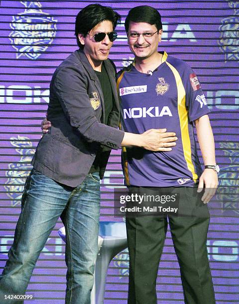 Owner and actor Shahrukh Khan and Viral Oza, Director-Marketing, Nokia India during a press conference announcing the Nokia and Kolkata Knight...