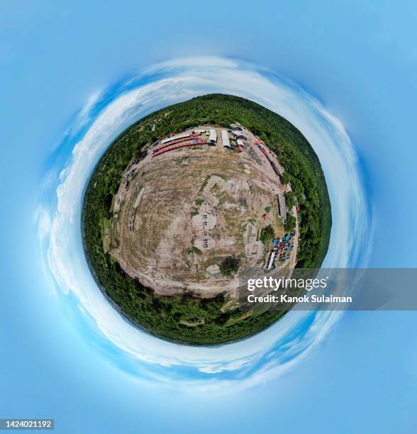 spinning little planet from aerial - 360 globe stockfoto's en -beelden