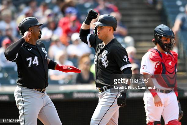 Eloy Jiménez and Gavin Sheets of the Chicago White Sox celebrate after scoring on a two-run home run hit by Sheets off Hunter Gaddis of the Cleveland...