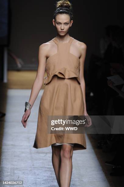 Model on the runway at Yves Saint Laurent's spring 2010 show at Palais de Tokyo. Designed by Stefano Pilati.