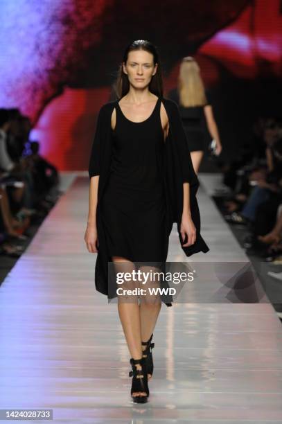 Model on the runway at Paolo Errico's spring 2010 show, part of the Incubatore Della Moda, at the Milano Moda Donna Sala Spiga.