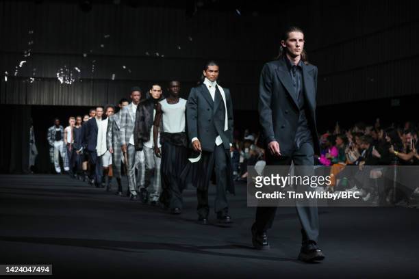 Models walk the runway at the Daniel W. Fletcher show during London Fashion Week September 2022 on September 15, 2022 in London, England.