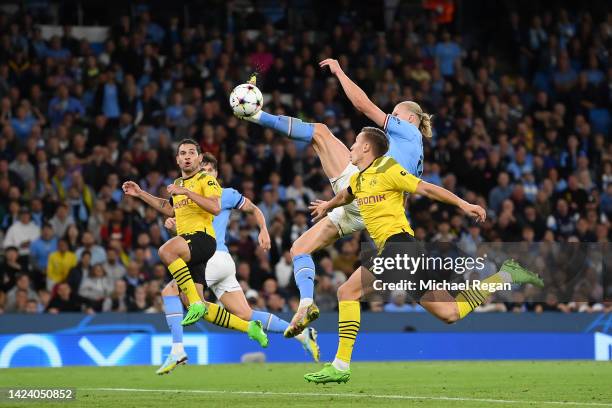 Erling Haaland of Manchester City scores their sides second goal during the UEFA Champions League group G match between Manchester City and Borussia...