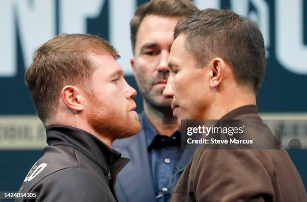 Undisputed super middleweight boxer Canelo Alvarez faces off with Gennadiy Golovkin during a news conference at the KA Theatre at MGM Grand Hotel &...