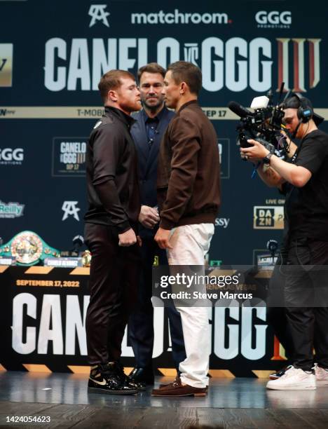 Undisputed super middleweight boxer Canelo Alvarez faces off with Gennadiy Golovkin during a news conference at the KA Theatre at MGM Grand Hotel &...