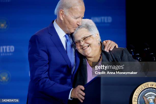 President Joe Biden embraces Susan Bro, mother of Heather Heyer, at the United We Stand Summit in the East Room of the White House on September 15,...