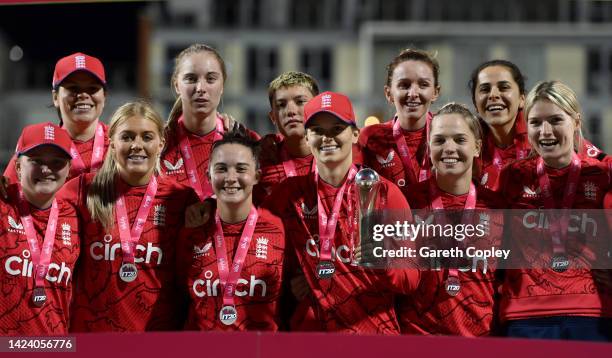 England celebrate with the series trophy after winning the 3rd Vitality IT20 match between England and India at Seat Unique Stadium on September 15,...