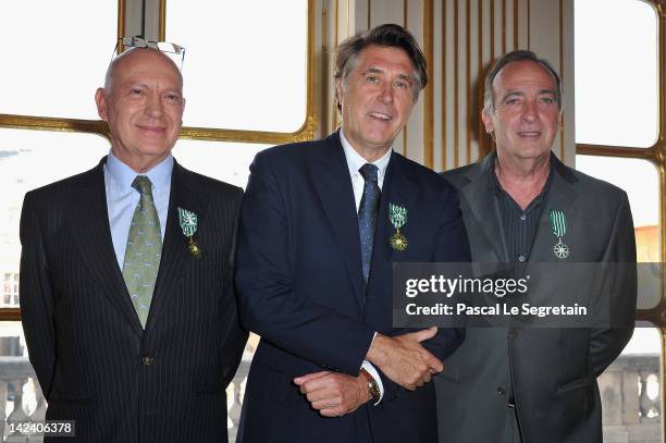 Bertrand Rindoff Petroff Officier des Arts et Des Lettres , Bryan Ferry and Yves Lecoq pose after being awarded by French Culture Minister at...