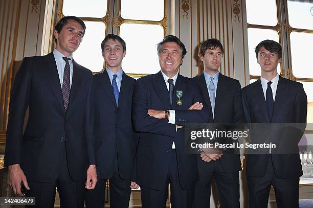 Brian Ferry poses with his sons from Left to right Otis, Merlin, Isaac and Tara after being awarded Officier Des Arts Et Des Lettres at Ministere de...