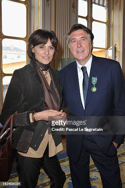 Ines De La Fressange and Bryan Ferry pose at Ministere de la Culture on April 4, 2012 in Paris, France.