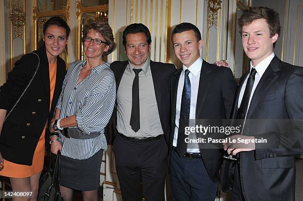 Laurent Gerra poses with Alexia, Valerie, Constentin and Benjamin Rindoff Petroff at Ministere de la Culture on April 4, 2012 in Paris, France.