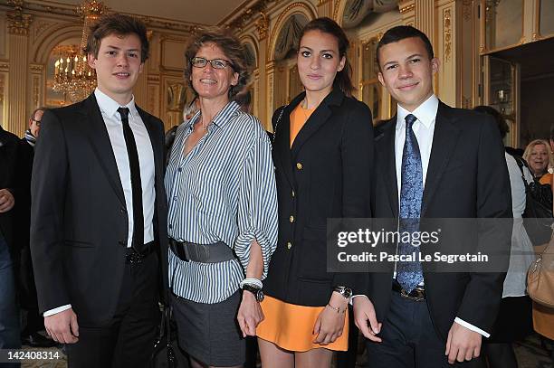 Benjamin, Valerie, Alexia and Constentin Rindoff Petroff pose at Ministere de la Culture on April 4, 2012 in Paris, France.