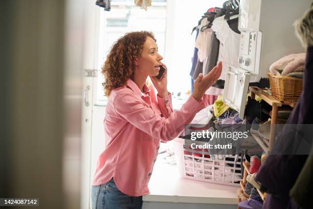 calling the plumber - boiler stockfoto's en -beelden