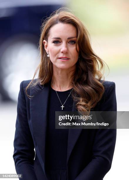 Catherine, Princess of Wales views floral tributes left at the entrance to Sandringham House, the Norfolk estate of Queen Elizabeth II, on September...