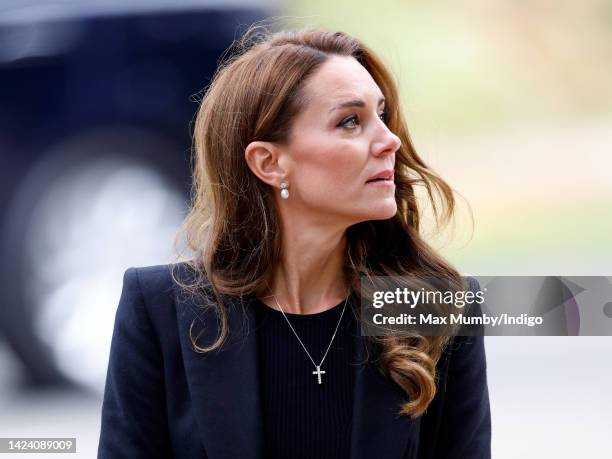 Catherine, Princess of Wales views floral tributes left at the entrance to Sandringham House, the Norfolk estate of Queen Elizabeth II, on September...