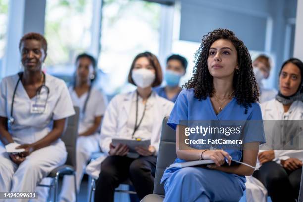 medical students at lecture - healthcare seminar stock pictures, royalty-free photos & images