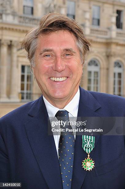 Bryan Ferry poses after being honored by French Ministerat Ministere de la Culture on April 4, 2012 in Paris, France.