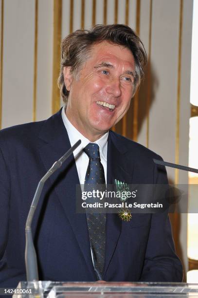 Bryan Ferry poses after being honored by French Ministerat Ministere de la Culture on April 4, 2012 in Paris, France.