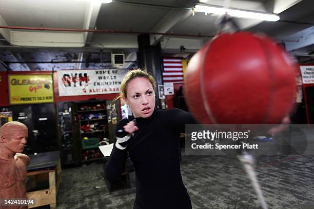 Female boxer Heather Hardy trains at Gleason's Gym on April 4, 2012 in New York City. Hardy, a 30 year old single mother who wants to turn pro, has...