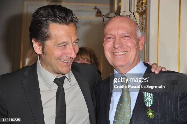 Bertrand Rindoff Petroff Officier des Arts et Des Lettres honored Chevalier Des Arts et Lettres by French Culture Minister poses with Laurent Gerra...