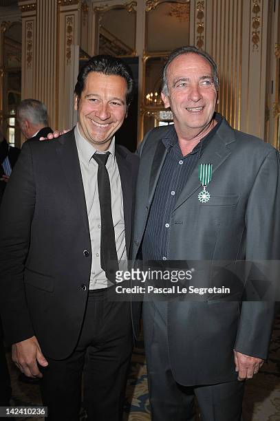 Laurent Gerra and Yves Lecoq pose at Ministere de la Culture on April 4, 2012 in Paris, France.