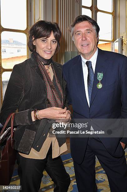 Ines De La Fressange and Bryan Ferry pose at Ministere de la Culture on April 4, 2012 in Paris, France.