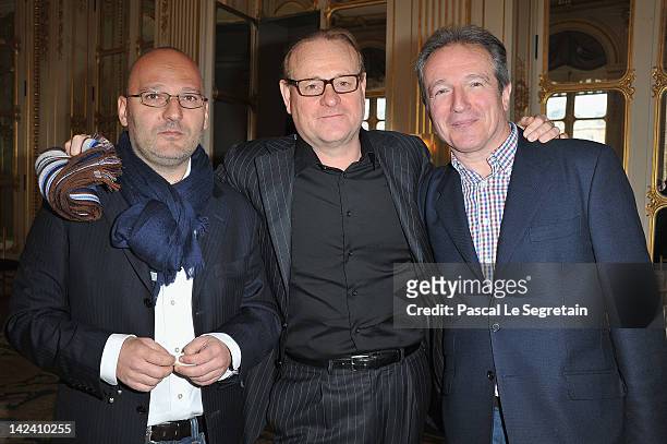 Olivier Borde Pierre Villard and Georges De Keerle pose at Ministere de la Culture on April 4, 2012 in Paris, France.
