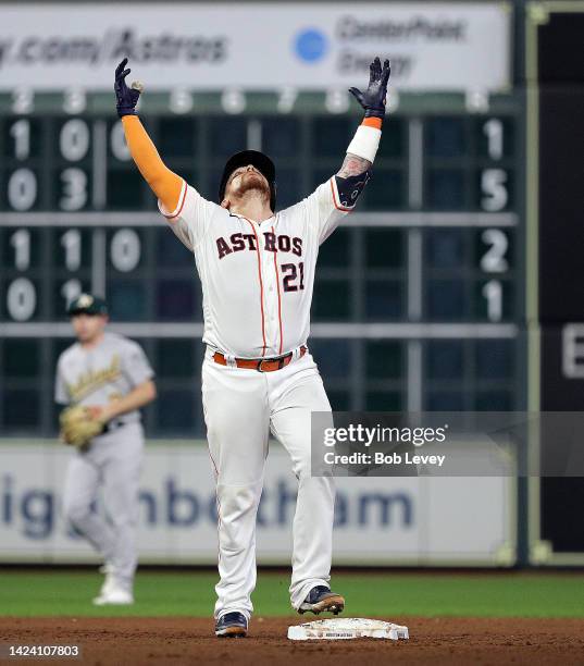 Christian Vasquez of the Houston Astros doubles in a run in the fourth inning against the Oakland Athletics at Minute Maid Park on September 15, 2022...