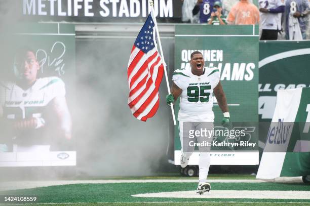 Quinnen Williams of the New York Jets runs onto the field prior to the start of the game against the Baltimore Ravens at MetLife Stadium on September...