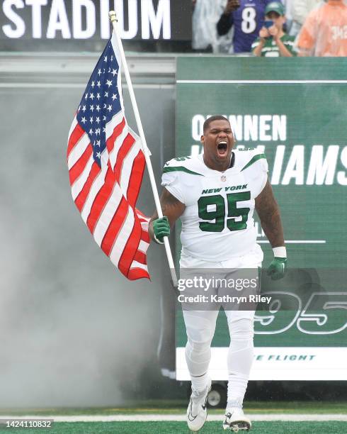 Quinnen Williams of the New York Jets runs onto the field prior to the start of the game against the Baltimore Ravens at MetLife Stadium on September...