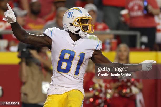 Mike Williams of the Los Angeles Chargers celebrates after scoring a touchdown during the third quarter against the Kansas City Chiefs at Arrowhead...