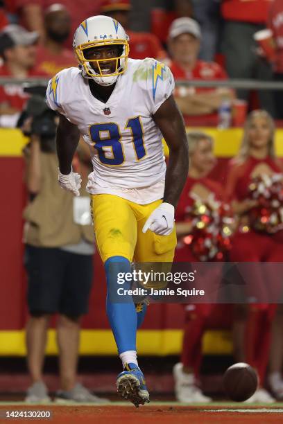 Mike Williams of the Los Angeles Chargers celebrates after scoring a touchdown during the third quarter against the Kansas City Chiefs at Arrowhead...