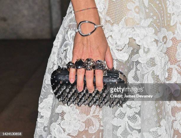 Emma Watson, clutch detail, arrives to the Caring for Women Dinner at The Pool Restaurant on September 15, 2022 in New York City.