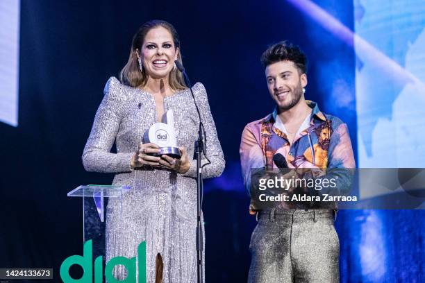 Pastora Soler accepts an award from Blas Canto during the "Cadena Dial" Awards gala on September 15, 2022 in Tenerife, Spain.