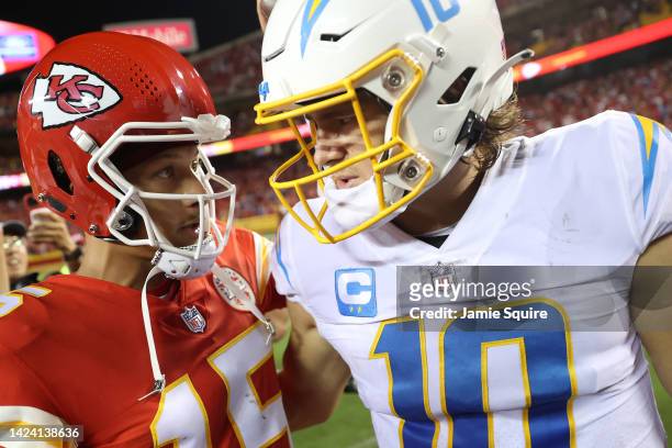 Patrick Mahomes of the Kansas City Chiefs shakes hands with Justin Herbert of the Los Angeles Chargers at Arrowhead Stadium on September 15, 2022 in...