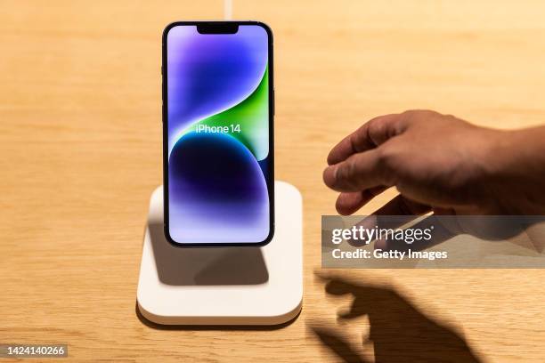 New Apple iPhone 14's are put on display at an Apple store on September 16,2022 in Wuhan. Hubei, China.