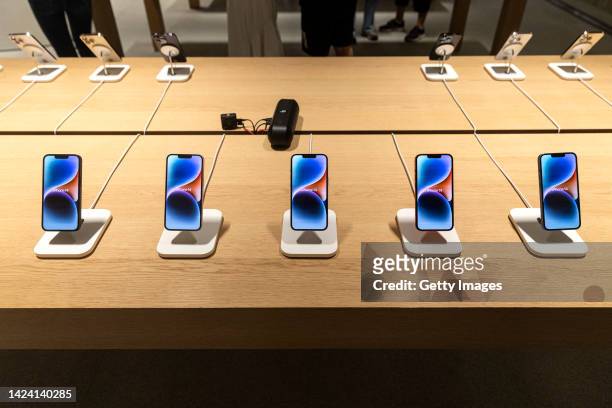 New Apple iPhone 14's are put on display at an Apple store on September 16,2022 in Wuhan. Hubei, China.