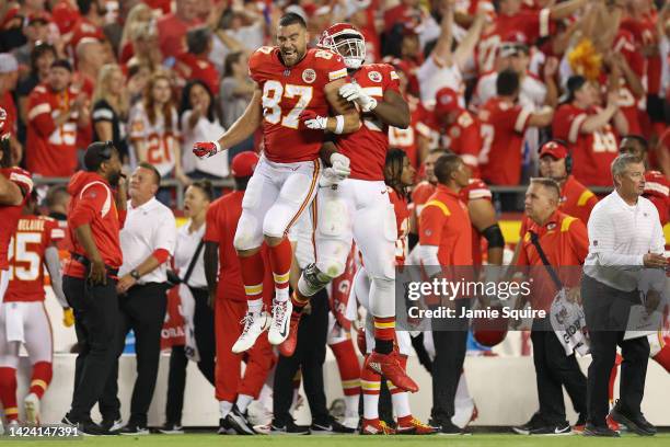 Chris Jones of the Kansas City Chiefs celebrates a sack with Travis Kelce during the third quarter against the Los Angeles Chargers at Arrowhead...