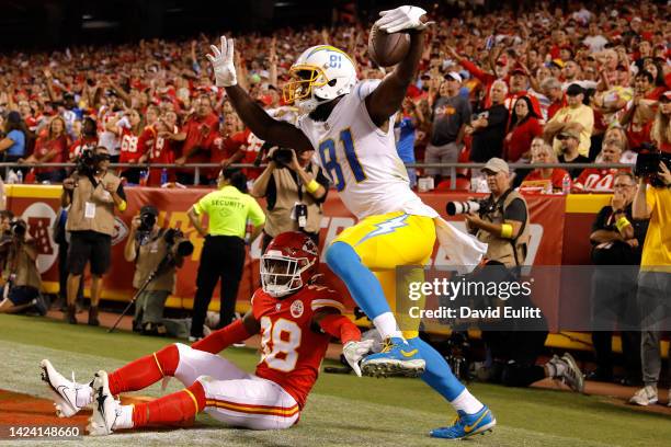 Mike Williams of the Los Angeles Chargers celebrates after catching the ball in front of L'Jarius Sneed of the Kansas City Chiefs for a touchdown...