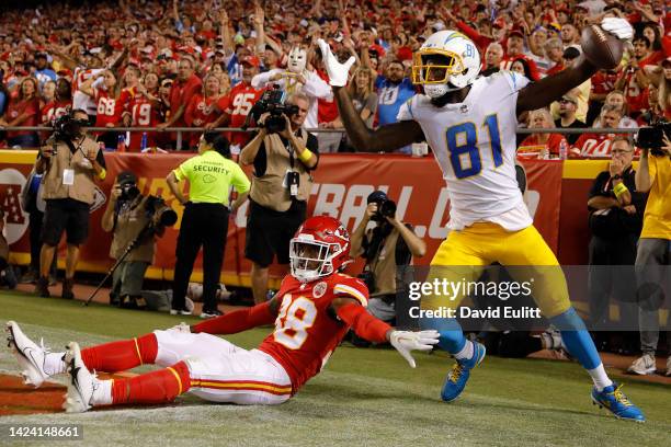 Mike Williams of the Los Angeles Chargers celebrates after catching the ball in front of L'Jarius Sneed of the Kansas City Chiefs for a touchdown...