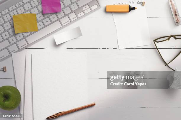 office table top  view with head phones, blank papers, eyeglasses...template - office desk top view stockfoto's en -beelden