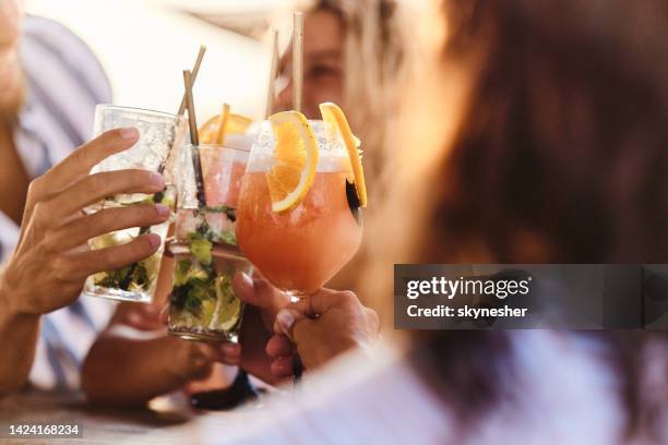 cheers dear friends! - cocktail fruits stockfoto's en -beelden