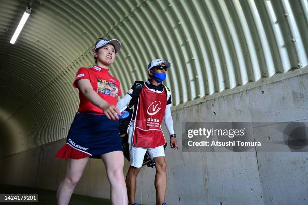 Yuna Nishimura of Japan walks through the tunnel during the first round of Sumitomo Life Vitality Ladies Tokai Classic at Shin Minami Aichi Country...
