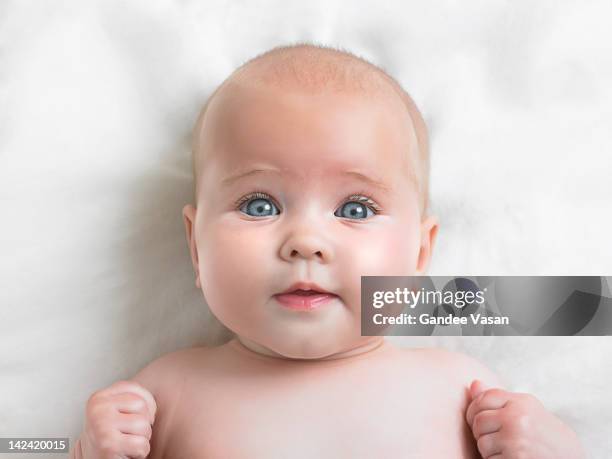 baby looking at camera - nudity photo stock pictures, royalty-free photos & images