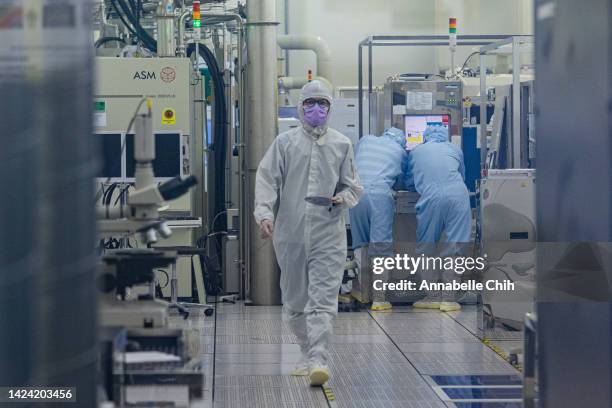 Student wears cleanroom suit conducts a research inside the clean room of Taiwan Semiconductor Research Institution during a press semiconductor tour...