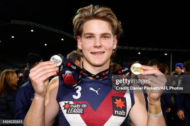 Will Ashcroft of the Dragons poses for a photograph with the best on ground and premiership medals after the NAB League Grand Final match between the...