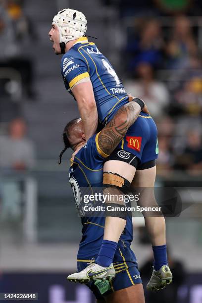 Junior Paulo of the Eels celebrates with Reed Mahoney of the Eels after scoring a try during the NRL Semi Final match between the Parramatta Eels and...